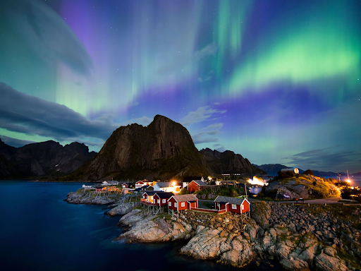 Northern Lights as observed in the skies over Reinefjorden in Reine, on Lofoten Islands in the Arctic Circle in 2017