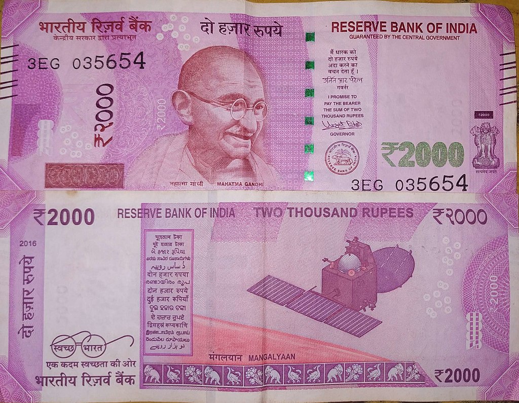 Indian currency featuring Mangalyaan mission